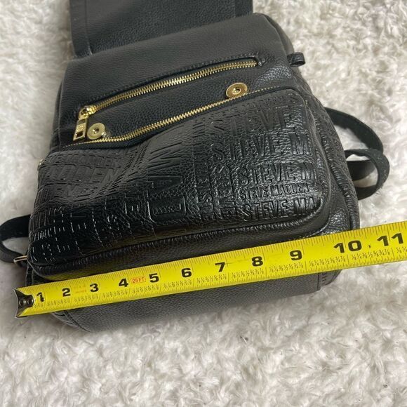 Steve Madden Black synthetic embossed small backpack gold tone hardwares. main image 12